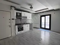 Bostanlı'da satılık 2+1 daire · fotoğraf 2