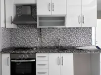 Bostanlı'da satılık 2+1 daire · fotoğraf 3